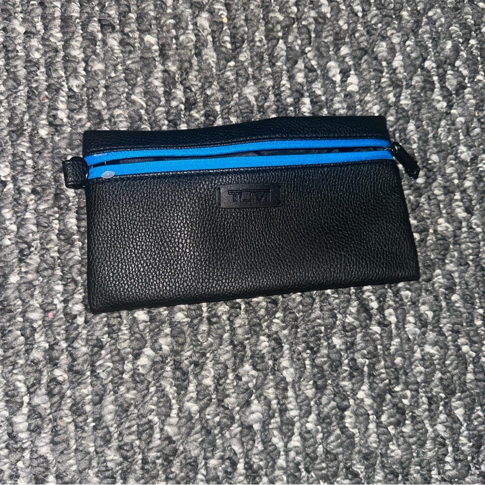 Tumi Black Wallet with Blue Accent